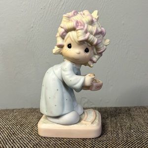 Precious Moments “The Spirit is Willing but the Flesh-is Weak” figurine.